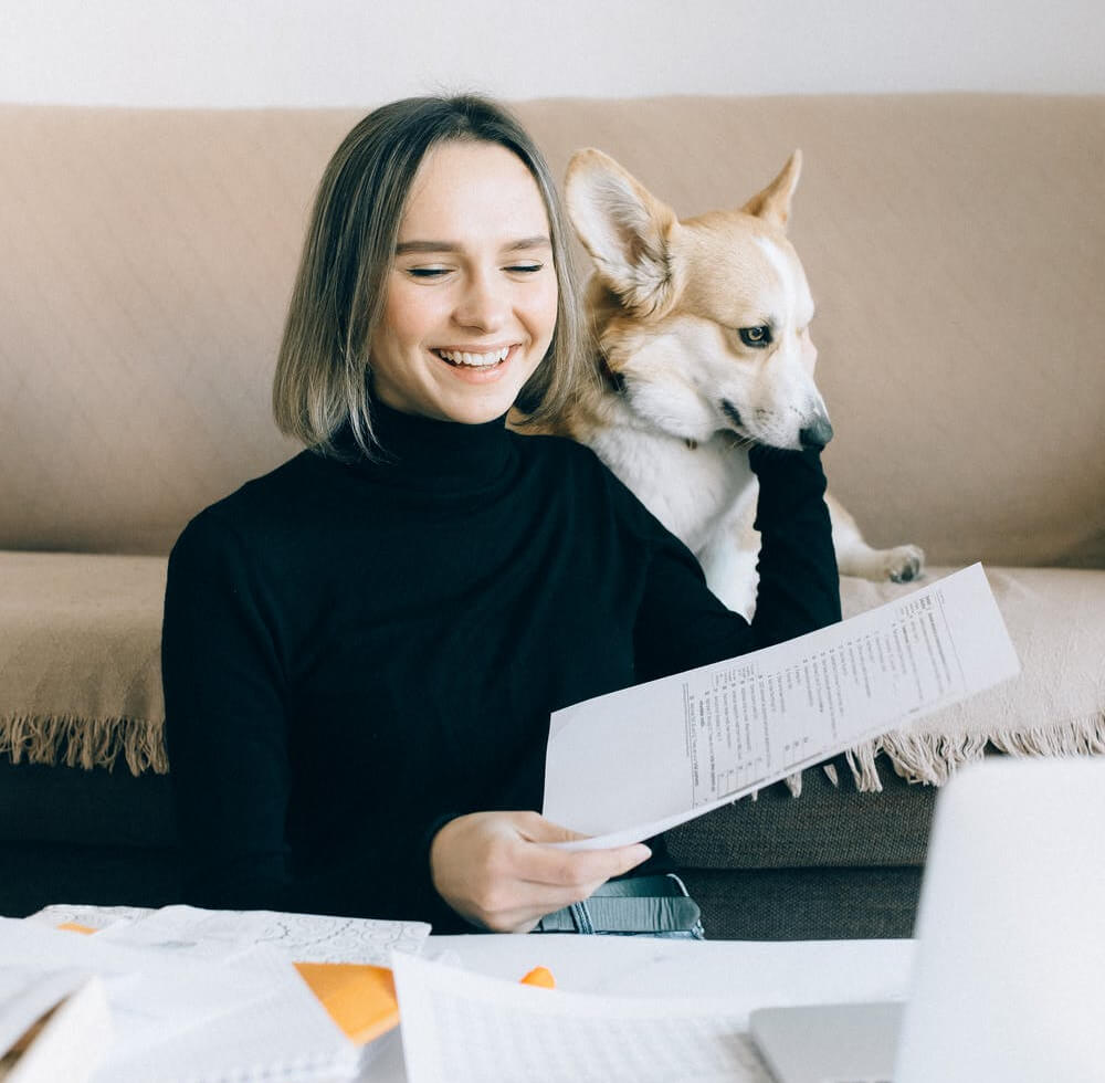 a person holding a dog