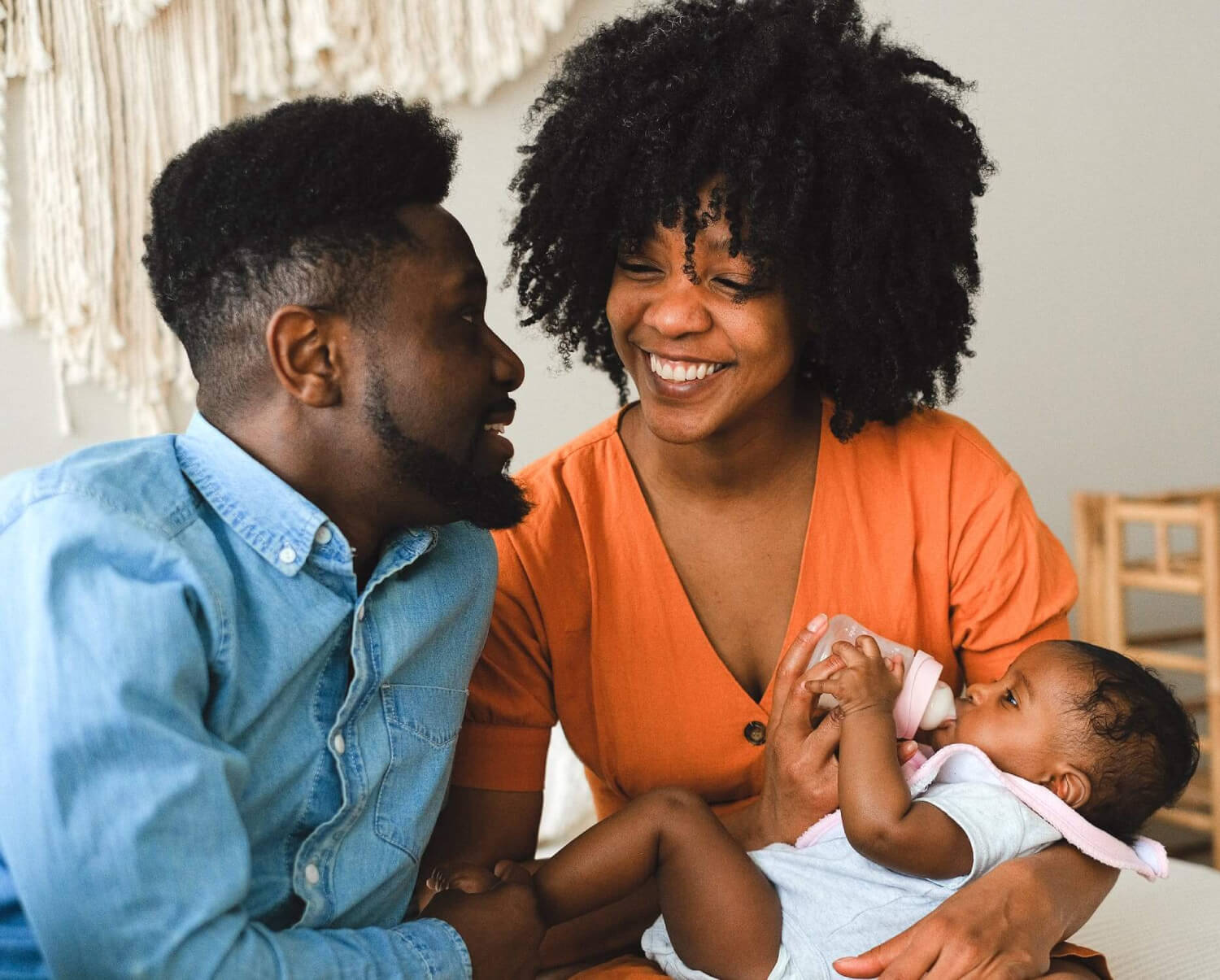 a man holding a baby