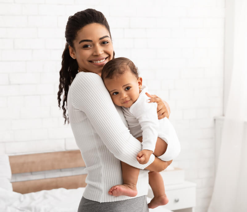 a person holding a baby